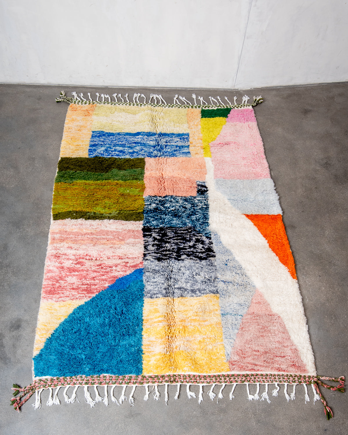 Modern, designer, handcrafted Berber rug from Morocco. Beniourain carpet with beautiful colours and patterns and fluffy wool texture.